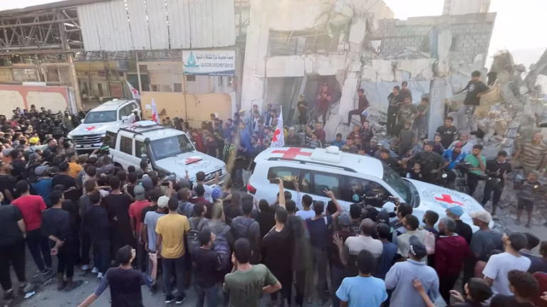 Hamas begins handing over Israeli hostages under ceasefire deal